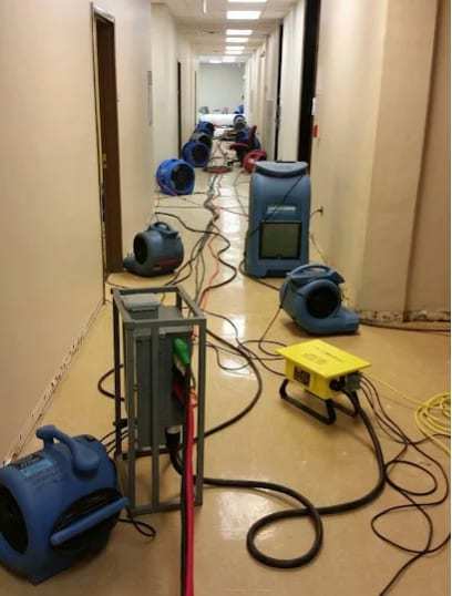 Long corridor drying setup with air movers and a dehumidifier
